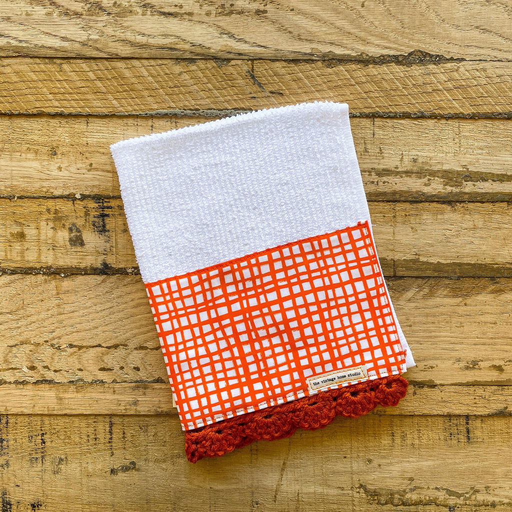 Orange Grid Crochet Kitchen Towel from the Crochet Kitchen Bar Mop Towel Collection at The Vintage Home Studio, an affordable home decor store in North Wilkesboro, NC.